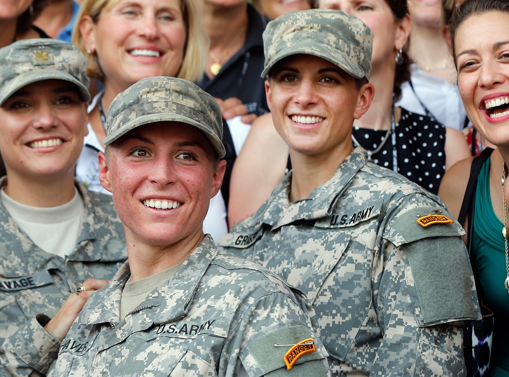 Figure 4 U.S. Army 1st Lt. Shaye Haver (Center) and Cpt. Kristen Griest (Right) pose for photos with other women West Point alumni after an Army Ranger school graduation ceremony at Fort Benning, Georgia.