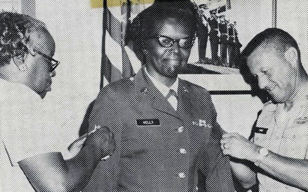 Figure 1 Sgt. Maj. Kelly (center) in 1972 getting promoted to her new rank by Brig. Gen. Jack T. Pink (right), director of enlisted personnel in Washington. Kelly’s mother, Maxie D. Kelly (left), assisted in the ceremony.