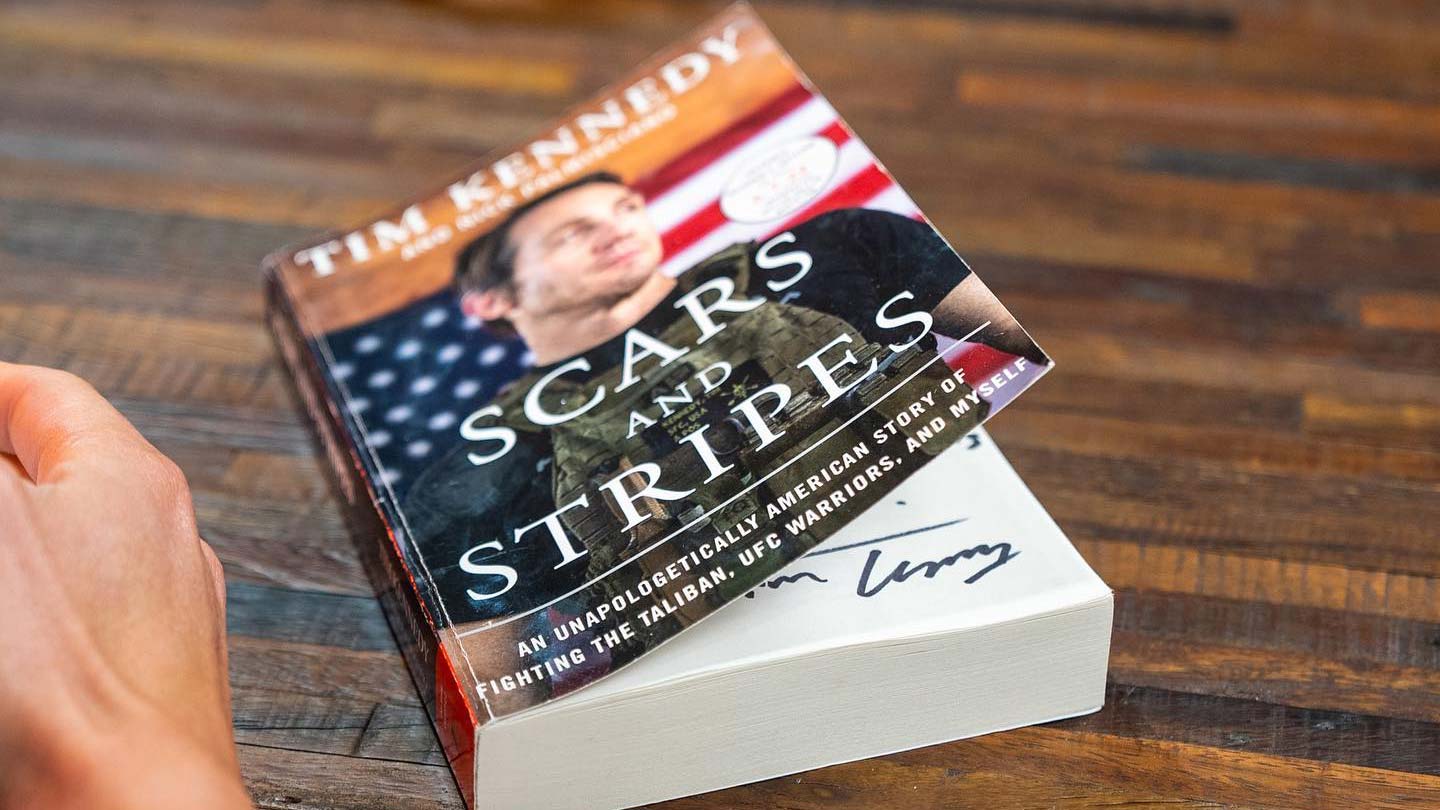 "Scars and Stripes" book cover for Wellness Weekend